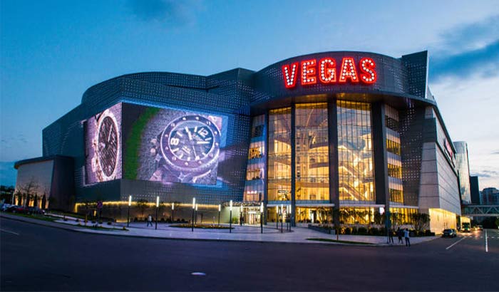 Vegas Crocus City shopping mall in, Moscow, Russia, featuring large and brightly colored billboards
